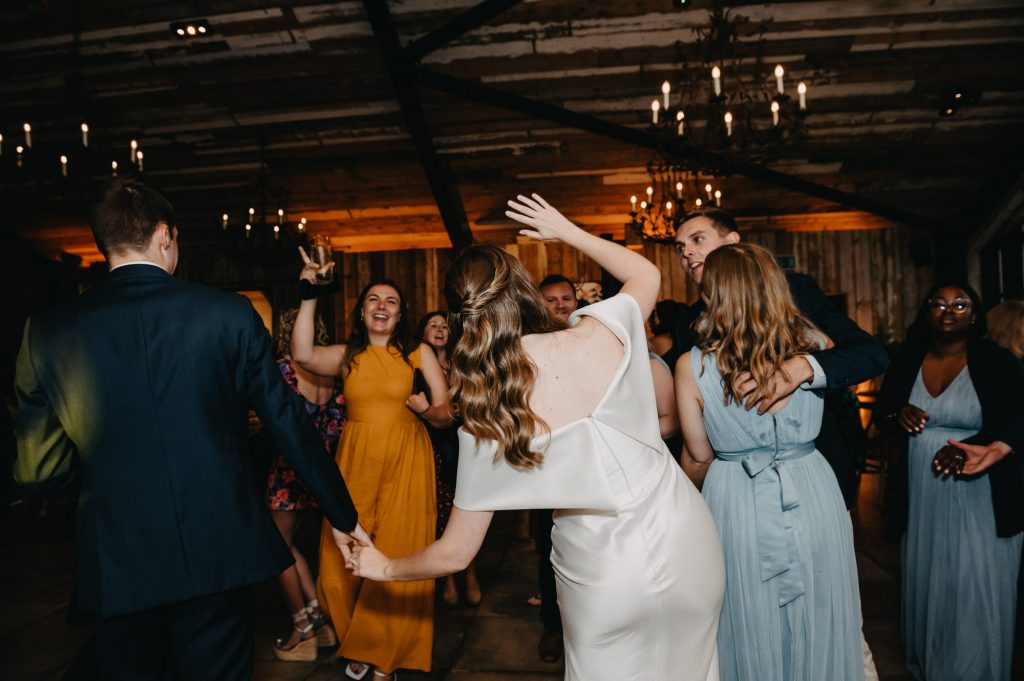 Fun and lively dance floor action at Barn at Botely Hill wedding. 