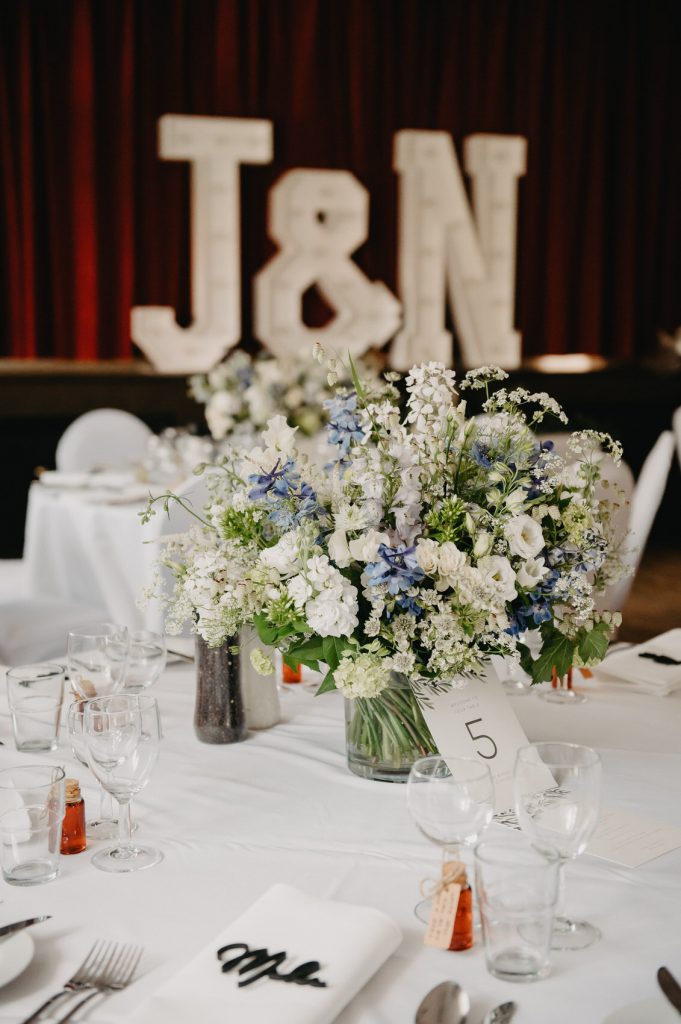 White Flower Wedding Table Arrangements - Surrey Village Hall Wedding