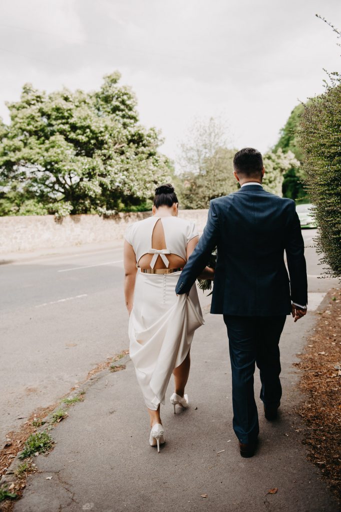 Documentary Wedding Photography - Couple Walk to Wedding Venue Together