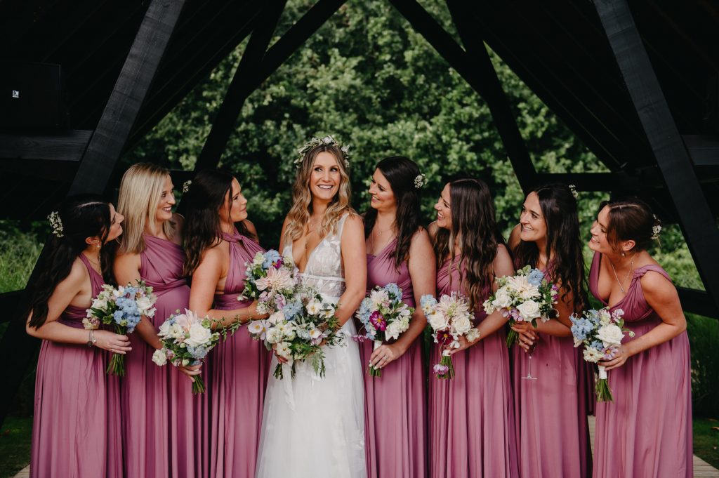 Candid Wedding Party Portrait - Bridal Party in Matching Pink Dresses