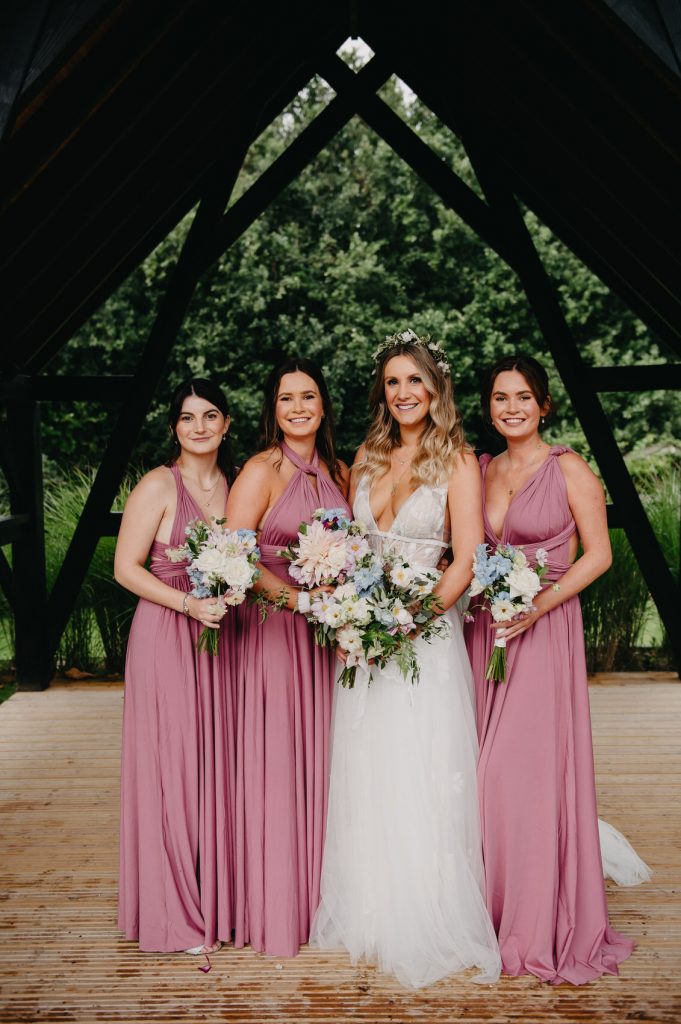 Candid Wedding Party Portrait - Bridal Party in Matching Pink Dresses