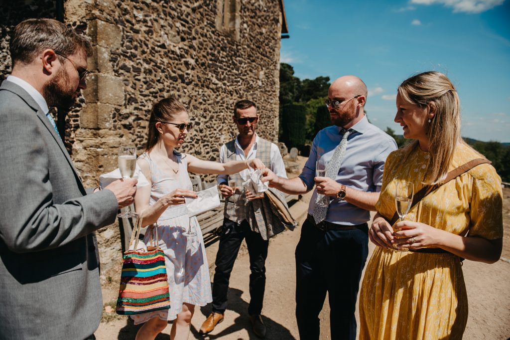 Guests Enjoy Cornish Pasties in Champagne Reception at Church 