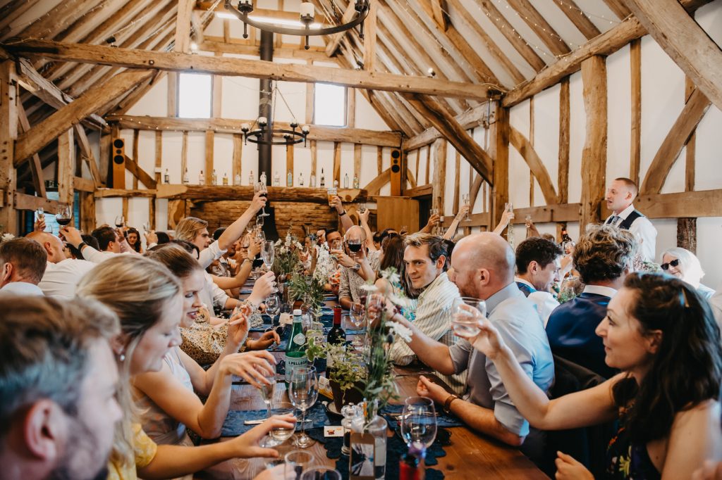Guests Cheers During Speeches - Rumbolds Farm Wedding