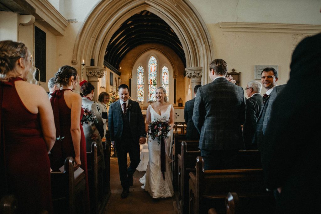 Newley Married Couple Walk Back Down The Aisle Together