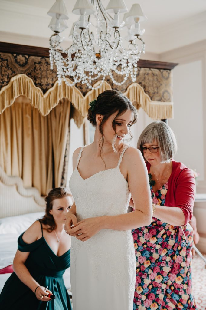 Moment The Bride Gets in The Dress - Natural Surrey Wedding Photography