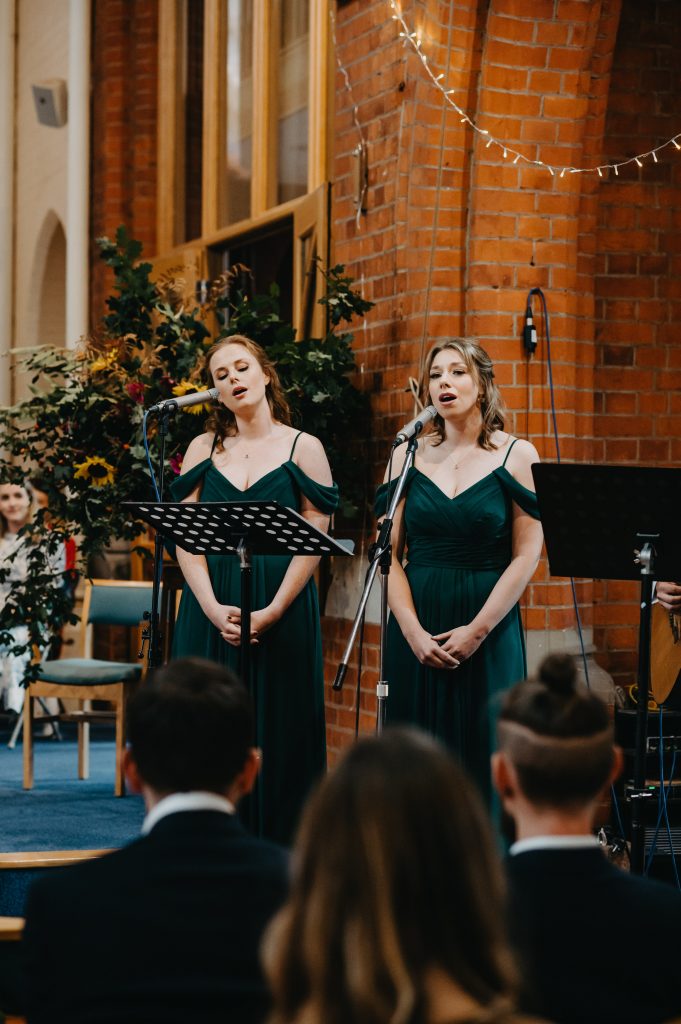 Bridal Party Sing Wedding Hymns - Church Wedding Photography