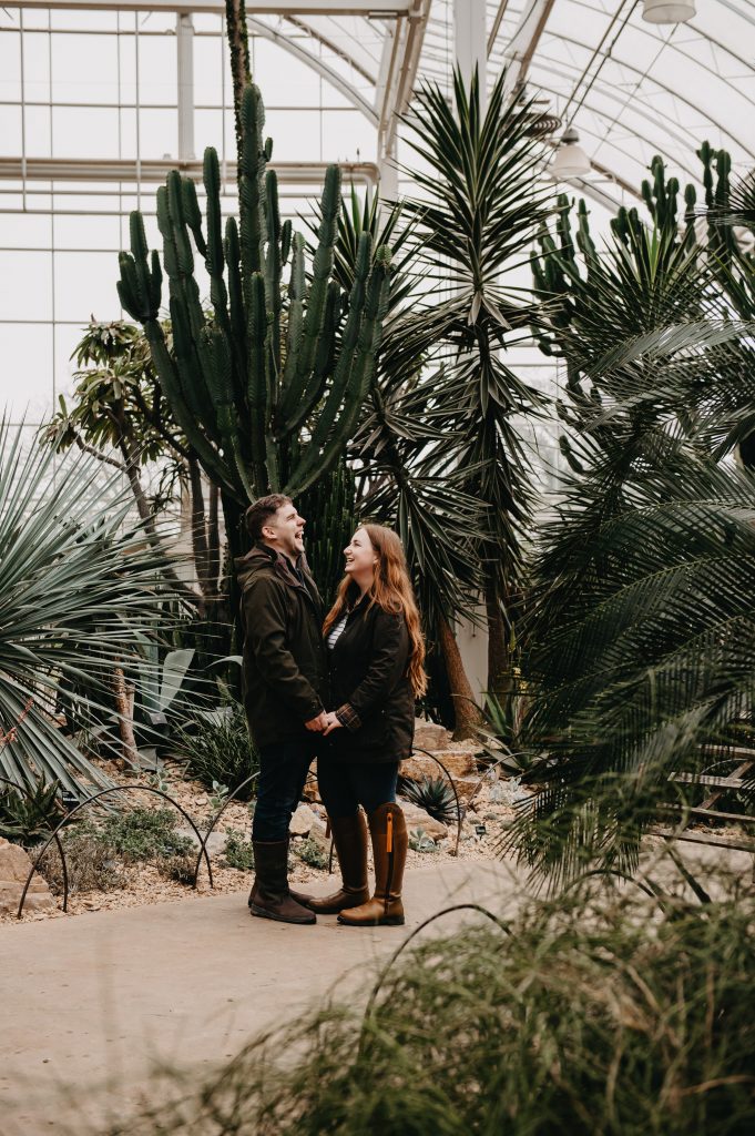 Wisley Gardens Engagement Shoot - Couples Portraits in Glasshouse
