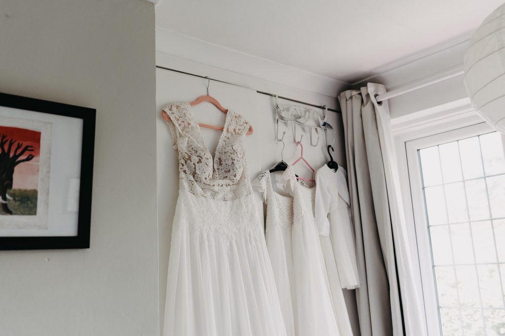 Mothers Wedding Dress and her Children's Hang on Wardrobe