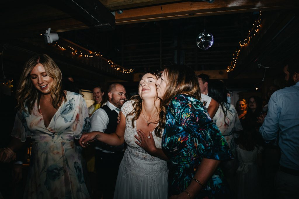 Mother and Daughter Embrace on Dance Floor - Surrey Wedding Photography