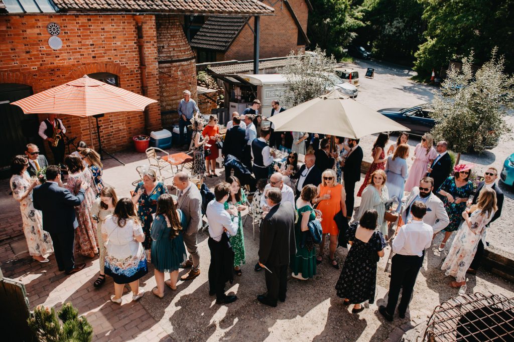 Guests Mingle in Sunshine at The Farnham Pottery
