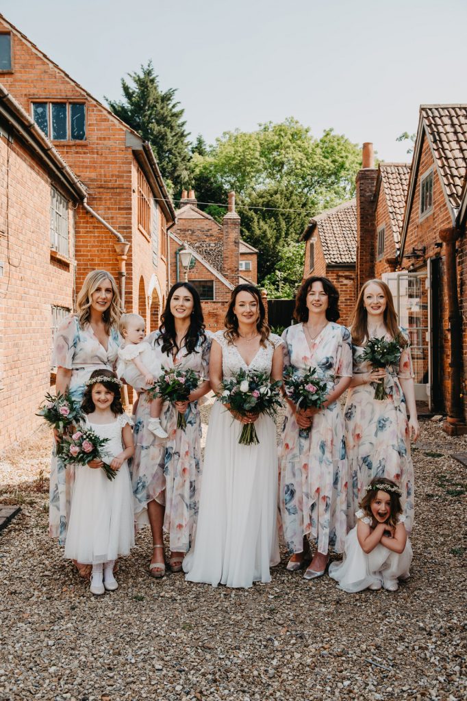 Natural Group Portrait of Bride and Bridal Party - Farnham Pottery Wedding