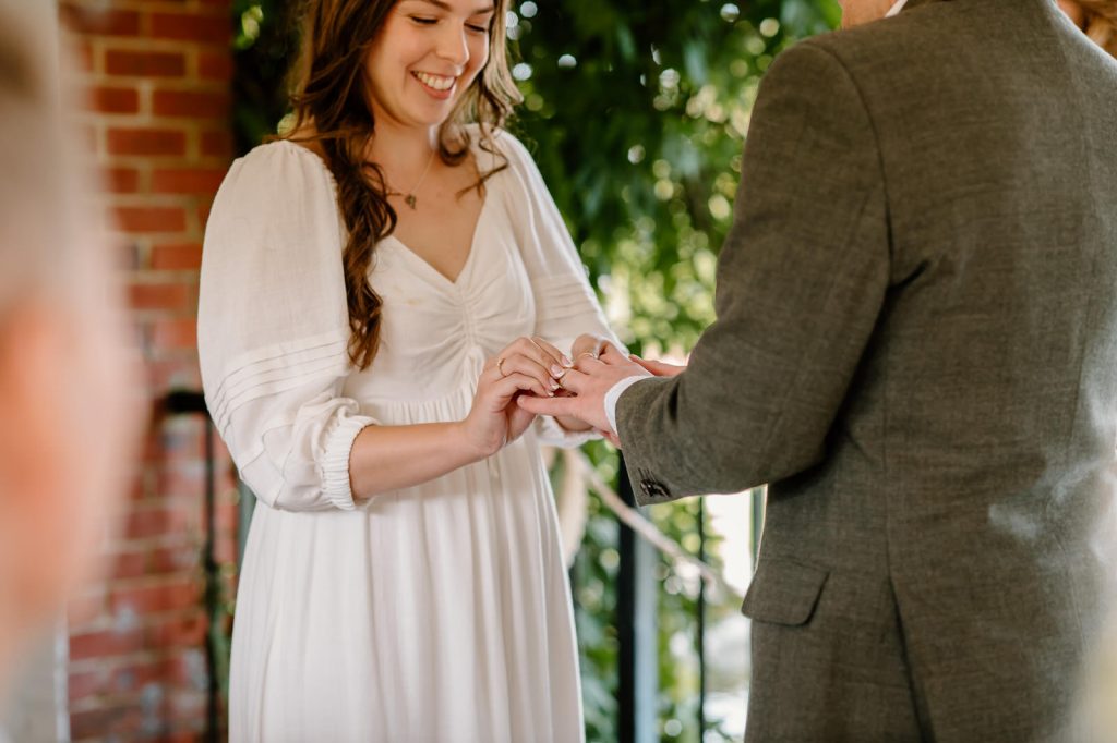 Ring Exchange Captured Naturally During Ceremony