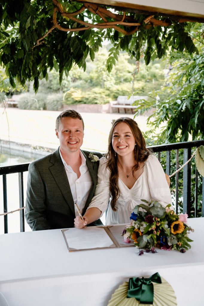Signing of The Register Captured Naturally - Surrey Wedding Photography