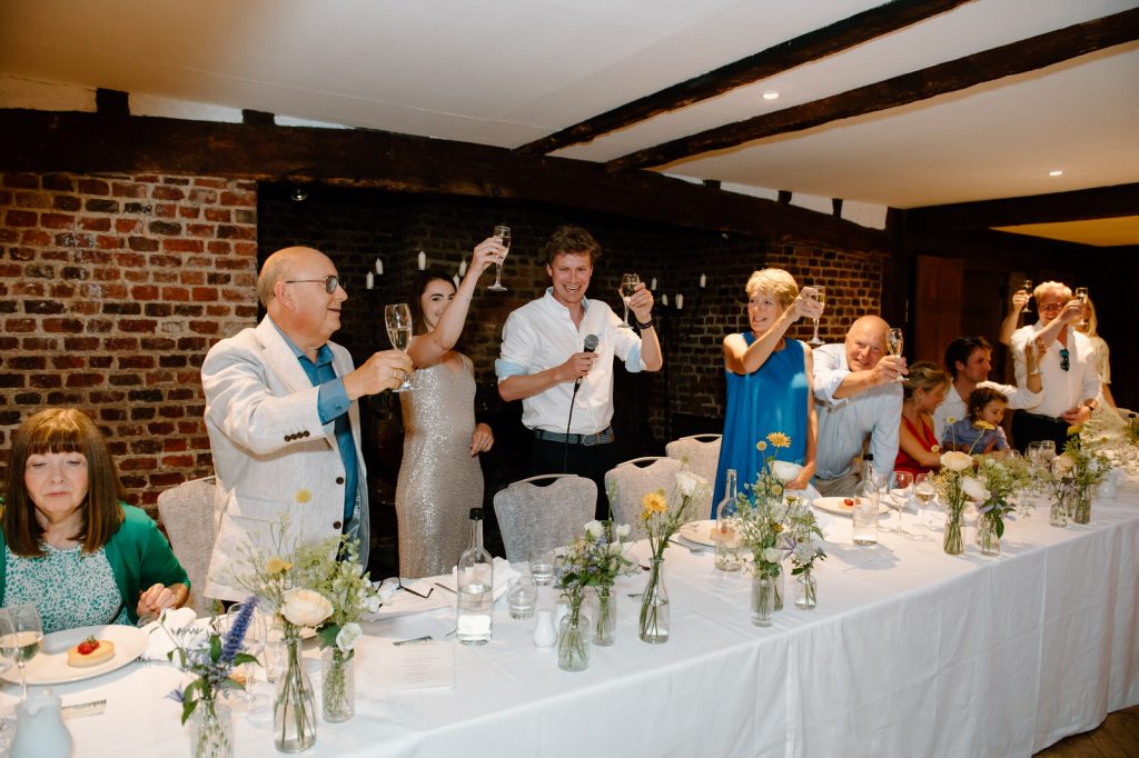 Guests Cheers During Speeches - Great Fosters 