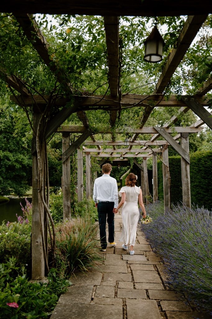 Couple Walk in The Gardens 