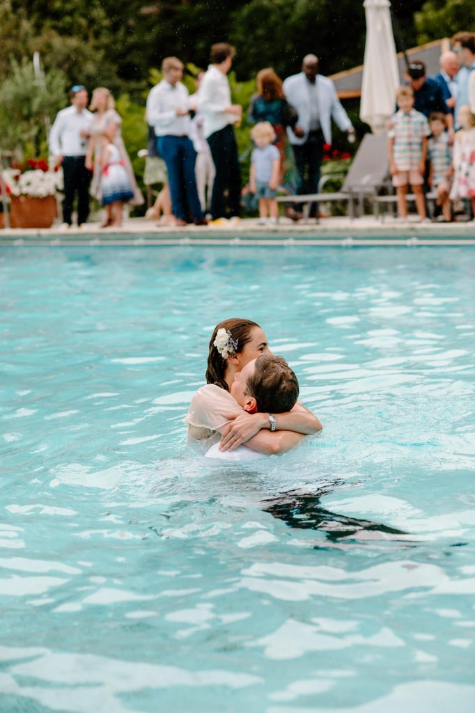 Fun and Spontaneous Photography - Couple Embrace as They Swim Together