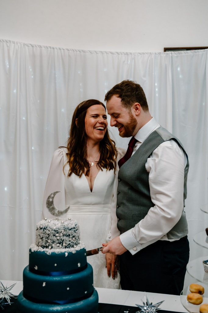 Couple Cuts the Homemade Wedding Cake