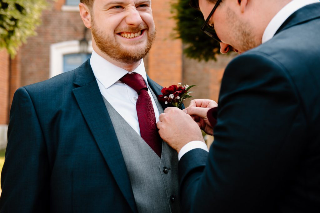 Documentary Wedding Photography - Groom Has Button Hole Attached