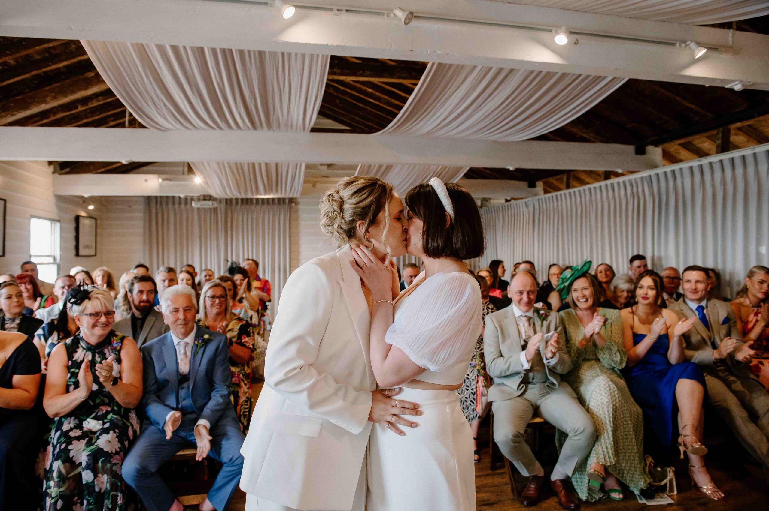 Couple Share First Kiss at East Quay Wedding Ceremony