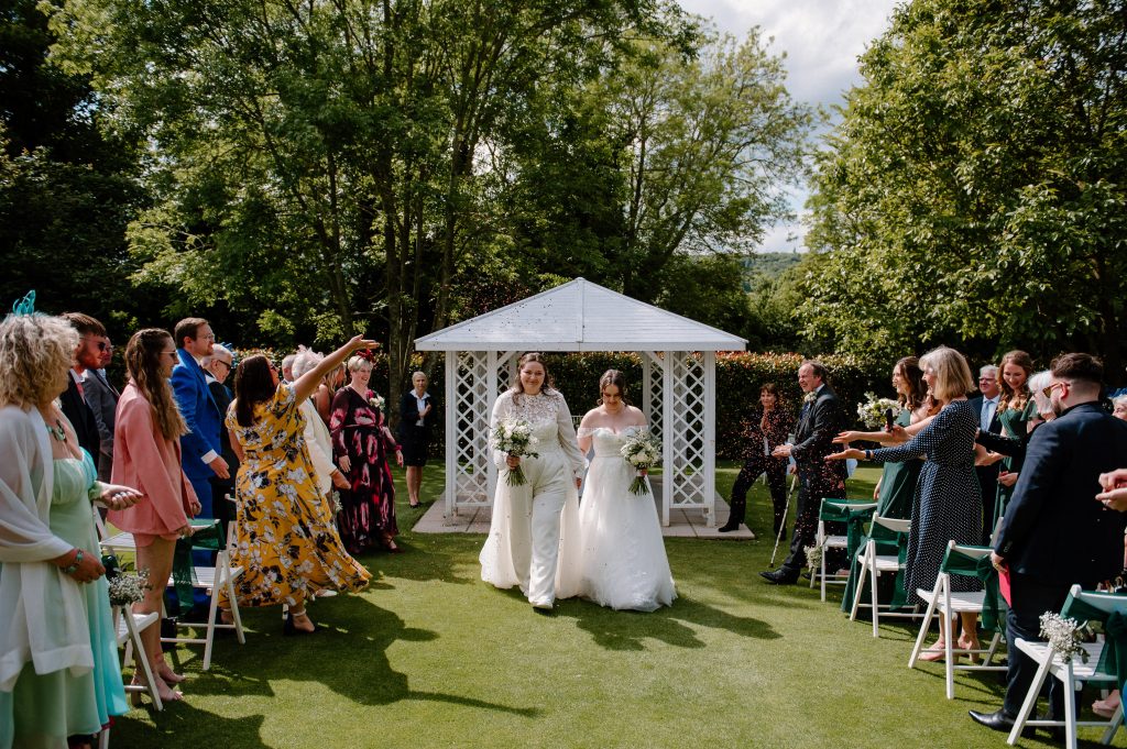 Couple Walk Down Confetti Aisle, Outdoor Wedding Ceremony