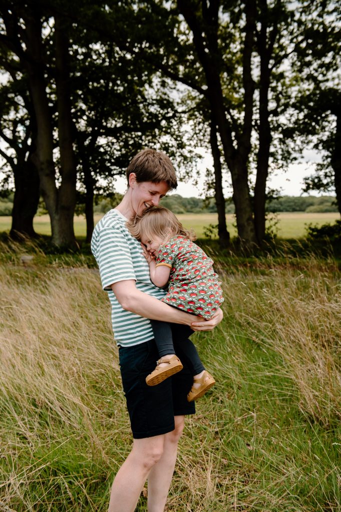 Cute mother and daughter portrait, outdoor family shoot.