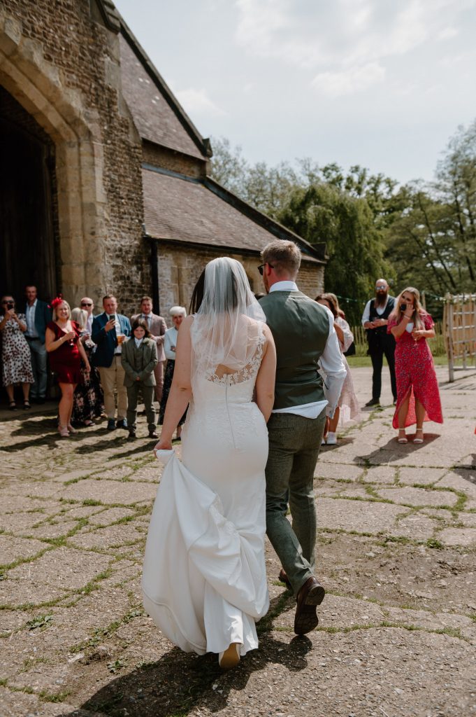 Couple Arrive in Style for Oxenford Farm Barn Wedding 