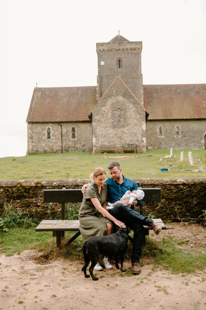 Family Sit Together on Bench Outdoors - Newborn Family Photography