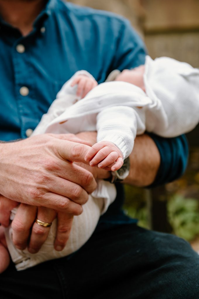 Father Holds Baby Newborn Baby Hand - Surrey Family Photography