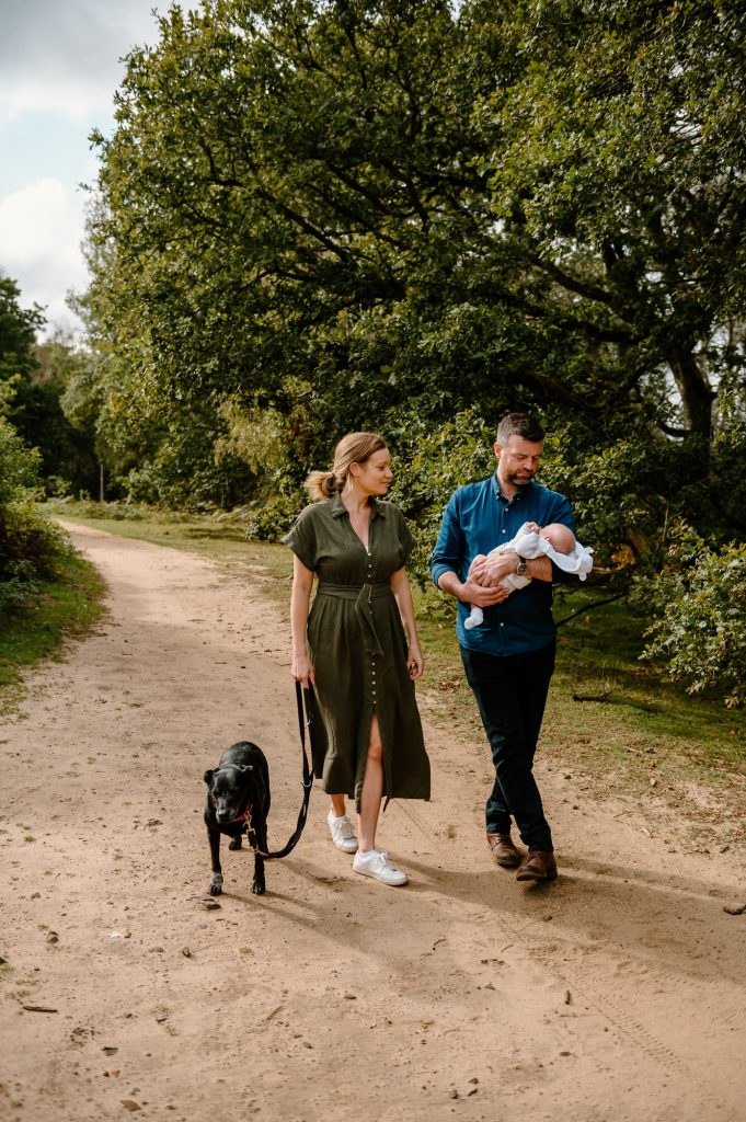 Relaxed and Candid Family walk Together Outdoors - Newborn Family Photography